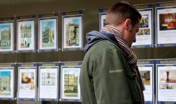 A pedestrian browses properties on display in the window of an estate agent on April 8, 2008 in London, England. The Halifax has announced that house prices fell in March by 2.5% over March. (Cate Gillon/Getty Images)