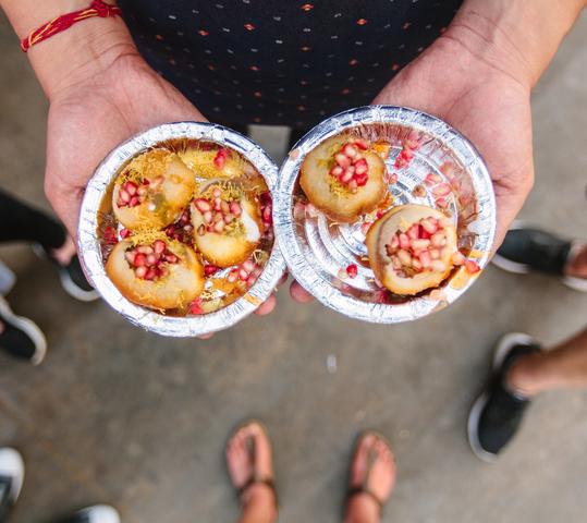 Pani puri, a common street snack, in Delhi. (Courtesy of Intrepid Travel)