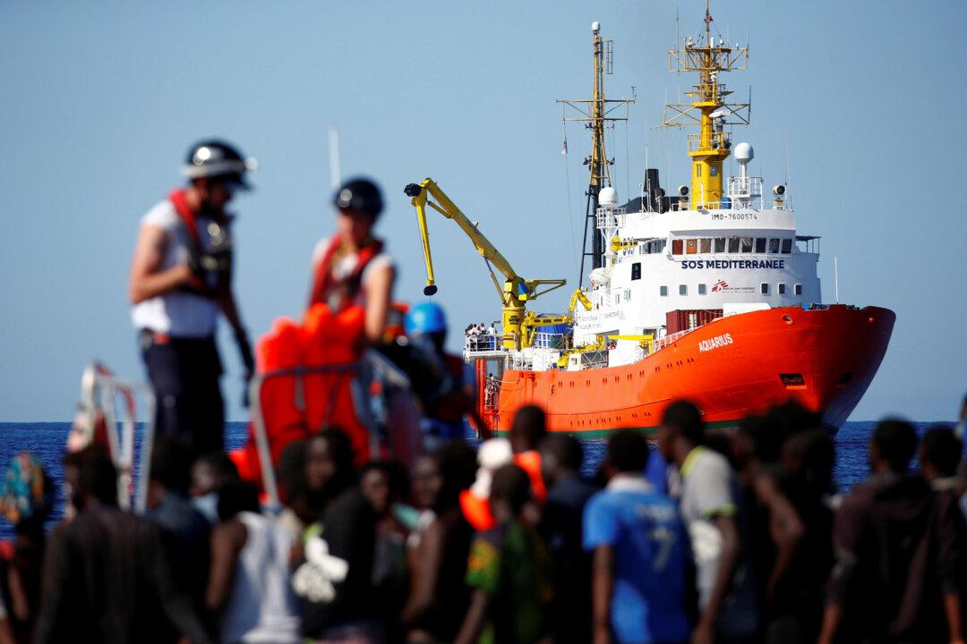 Activists Protest as Italy Prepares to Ship Migrants to Spain
