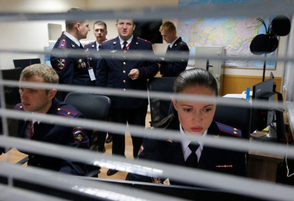 Russian Interior Ministry officers work during the opening of the International Police Cooperation Centre ahead of the 2018 FIFA World Cup in Domodedovo near Moscow, Russia, June 12, 2018. (Reuters/Sergei Karpukhin)