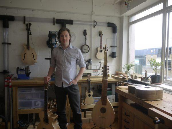 Musical instrument maker Alex Potter with his reconstructed 17th-century ceterone, 2013. (Courtesy of Alex Potter)