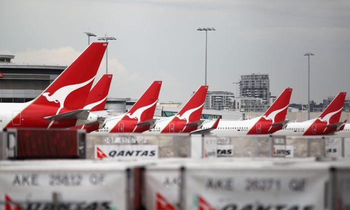 Qantas to Stand Down Most of 30,000 Staff