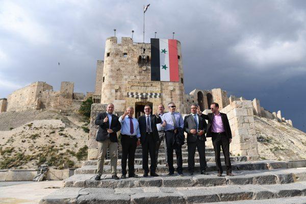 Member of the European Parliament from Germany's National Democratic Party Udo Voigt (2nd-L) visits the Citadel of Aleppo on June 4, 2018. (George Ourfalian/AFP/Getty Images)