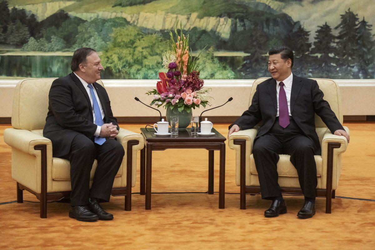 Secretary of State Mike Pompeo (L) speaks with Chinese leader Xi Jinping during a meeting at the Great Hall of the People in Beijing on June 14, 2018. (Fred Dufour/AFP/Getty Images)