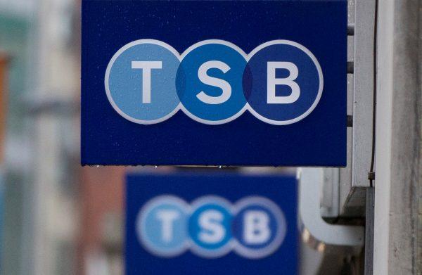Signs outside a branch of TSB bank in London May 27, 2014. (Reuters/Neil Hall/File Photo)