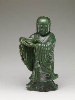 Temple attendant, 18th century (Qing Dynasty). Jade (nephrite), 12 inches high, 6 ½ inches wide, gift of Florence and Herbert Irving, 2015. (The Metropolitan Museum of Art)