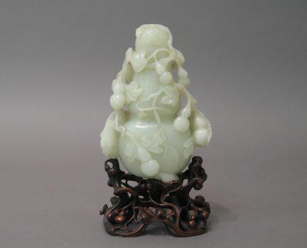 Bottle in the shape of a gourd, 19th century (Qing Dynasty). Jade (nephrite), gift of Florence and Herbert Irving, 2015. (The Metropolitan Museum of Art)