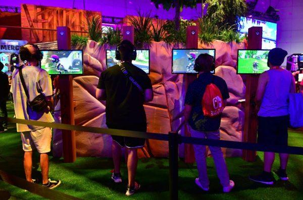 Gaming fans play the game "Fortnite" at the 24th Electronic Expo, or E3 2018 in Los Angeles, California on June 13, 2018. (Frederic J. Brown/AFP/Getty Images)