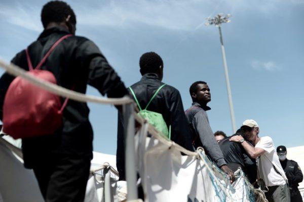 Migrants disembark from the Aquarius rescue ship after arriving to port in Valencia, Spain, June 17, 2018. Kenny Karpov/SOS Mediterranee/Handout via Reuters