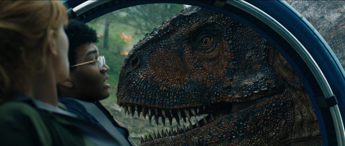 Claire (Bryce Dallas Howard) and Franklin (Justice Smith) are trapped by a Carnotaurus in "Jurassic World: Fallen Kingdom." (Giles Keyte/Universal Studios/Amblin Entertainment, Inc./Legendary Pictures Productions, LLC)
