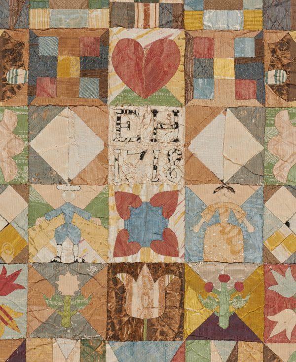 Pictures in the 1718 coverlet hint of life at that time, but "E H" remains a mystery.<br/>(American Museum in Britain)