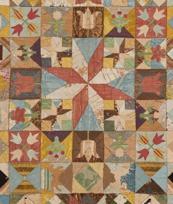 Emblems and motifs in the 1718 coverlet are mirrored in some of the museum's American folk art. (American Museum in Britain)
