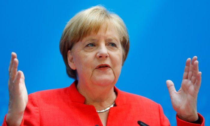 Merkel Avoids Collapse of Her Coalition, for Now
