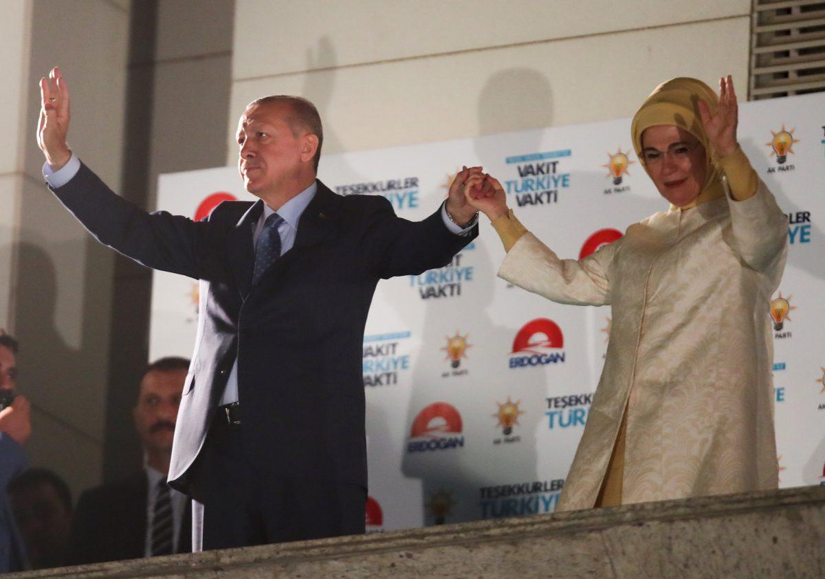 Turkish President Tayyip Erdogan and his wife Emine Erdogan greet supporters at the AKP headquarters in Ankara, Turkey June 25, 2018. (Reuters/Umit Bektas).