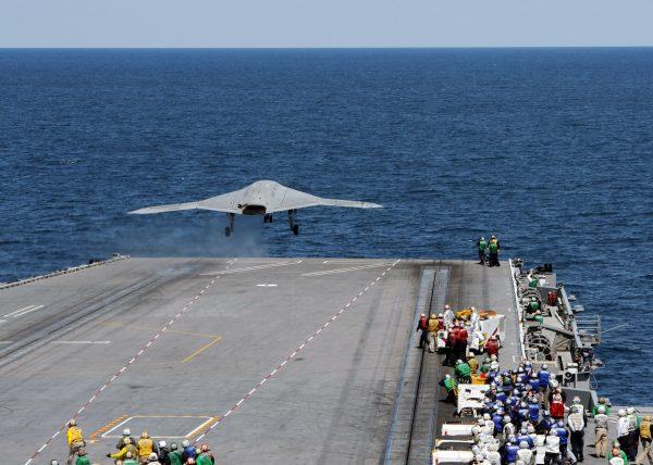 In this handout released by the U.S. Navy, An X-47B Unmanned Combat Air System (UCAS) demonstrator launches from the flight deck of the aircraft carrier USS George H.W. Bush (CVN 77) May 14, 2013, in the Atlantic Ocean. (US Navy via Getty Images)