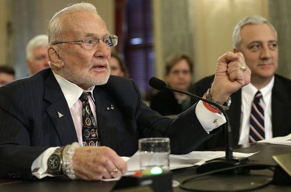 Former NASA astronauts Buzz Aldrin (L) and Michael Massimino (R) testify before the Senate Space, Science, and Competitiveness Subcommittee on Capitol Hill, on Feb. 24, 2015, in Washington. (Win McNamee/Getty Images)