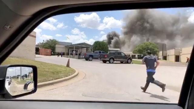 Smoke rises above the Coryell Memorial Hospital in Gatesville, Texas, on June 26, 2018, in this picture obtained from social media. (Sue Eckhardt via Reuters)