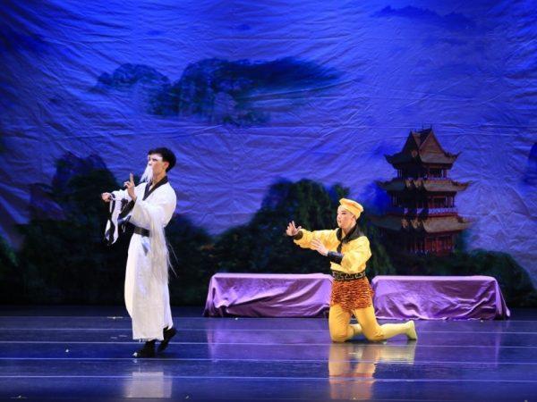 In Act Two, the grown-up Monkey King, played by 12th grader Justin Hui, wants to learn the Tao from a Taoist master, played by 12th grader Graham Sak, in order to become an immortal. (Courtesy of Xunqing Li/Xian Yun Academy)
