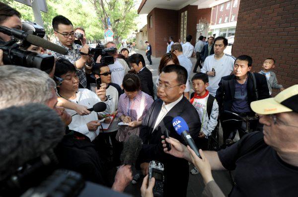 Foreign journalists interview Chinese rights lawyer Jiang Tianyong in Beijing on May 2, 2012. (Mark Ralston/AFP/Getty Images)