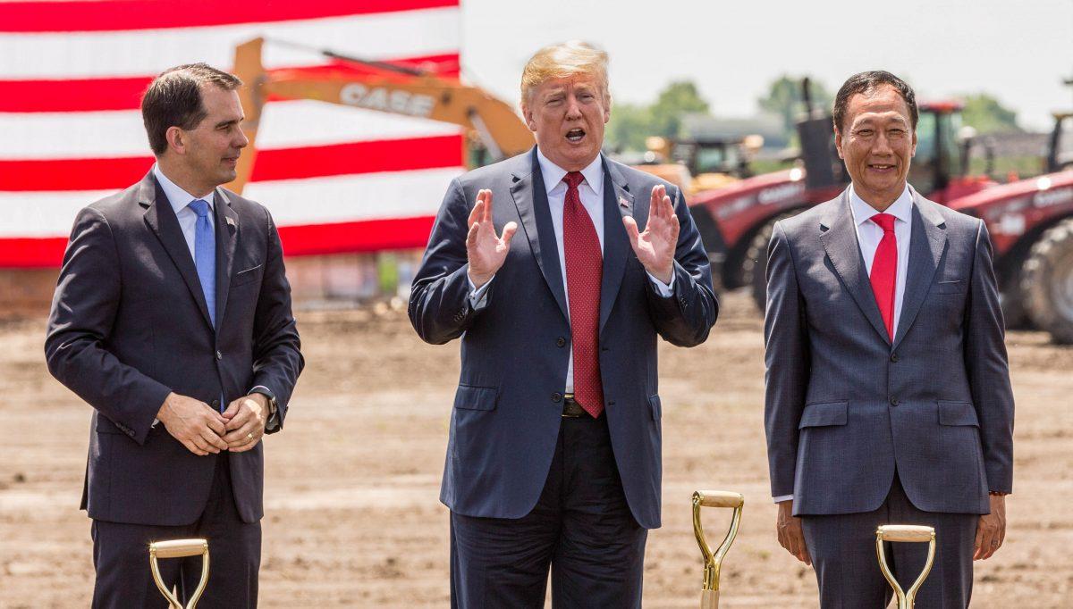 President Donald Trump (C), Wisconsin Gov. Scott Walker (L), and Foxconn CEO Terry Gou at the groundbreaking for the Foxconn Technology Group computer screen plant in Mt Pleasant, Wis., on June 28, 2018. (Andy Manis/Getty Images)