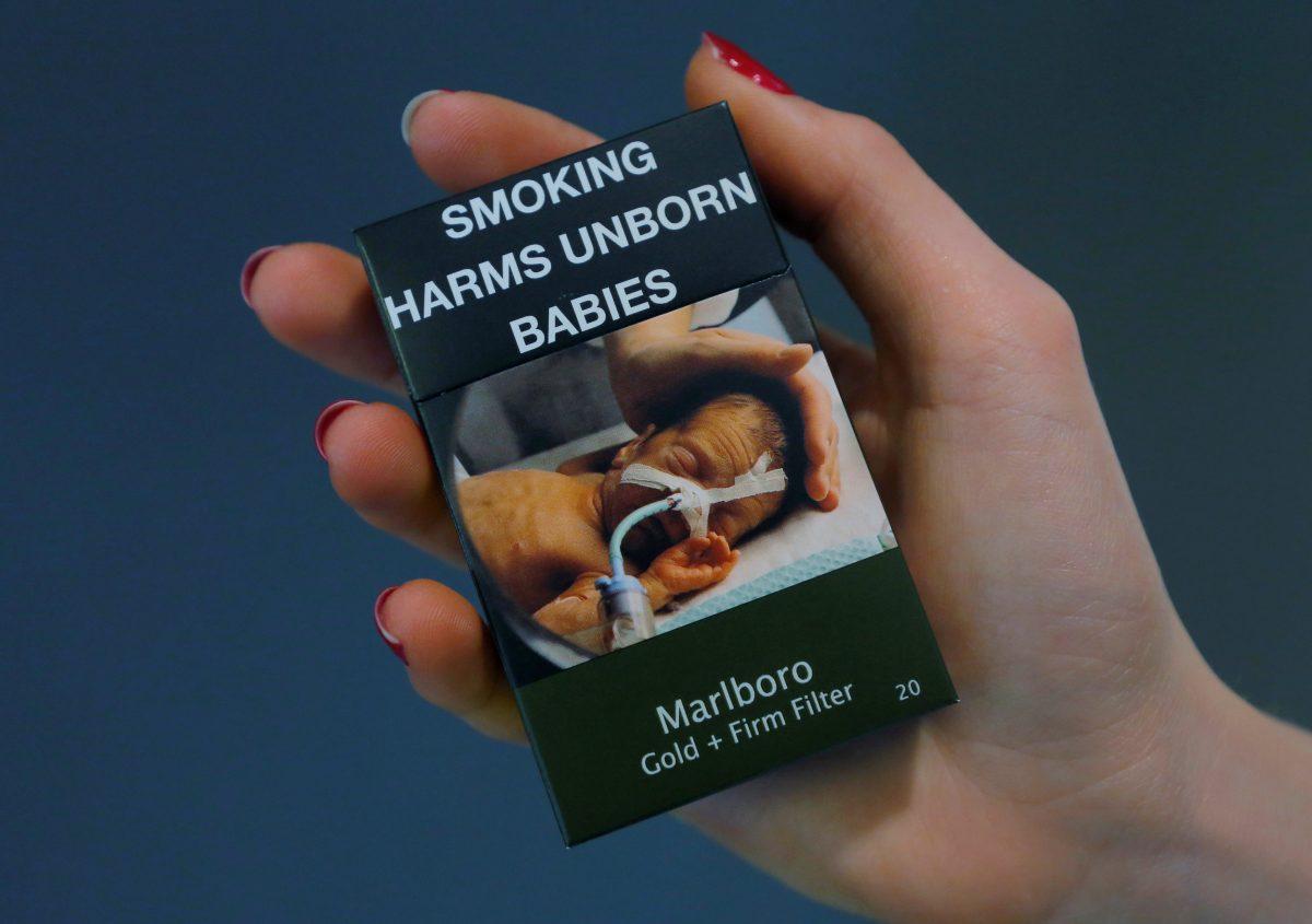 A packet of Marlboro cigarettes made by Philip Morris are pictured in this photo illustration July 3, 2017. (Reuters/Jason Reed)