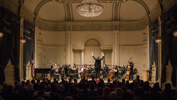 Alexander Rohatyn performs Schumann’s Cello Concerto as the top prize-winner with New York Concerti Sinfonietta in Carnegie Hall: 2018 International Shining Stars. (James Eden)