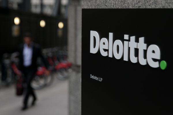 A Deloitte logo is pictured on a sign outside the company's offices in London on Sept. 25, 2017. (Daniel Leal-Olivas/AFP/Getty Images)