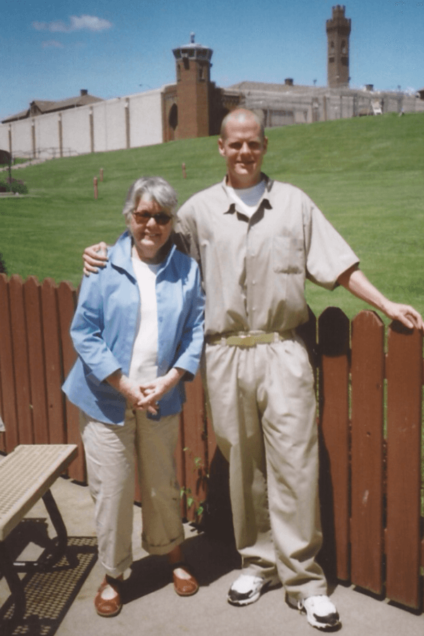 Christopher Poulos with his grandmother at United States Penitentiary Lewisburg. (Courtesy of Christopher Poulos)