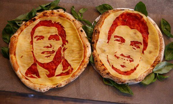 <br/>Pizzas decorated with portraits of Portugal's Cristiano Ronaldo and Uruguay's Luis Suarez prepared by chef Valery Maksimchik at HopHead Tap Room in St. Petersburg, Russia, on June 29. (REUTERS/Anton Vaganov)