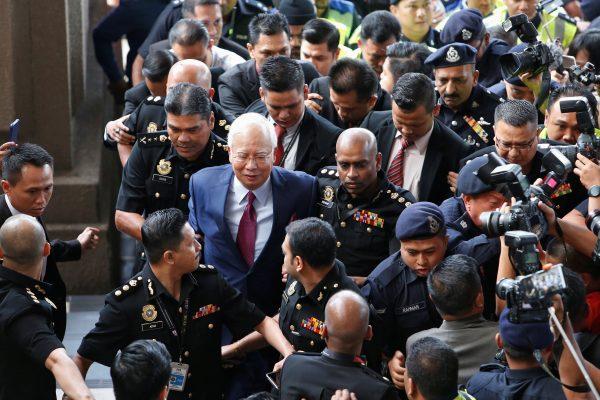 Former Malaysian Prime Minister Najib Razak arrives in court in Kuala Lumpur, Malaysia, on July 4, 2018. (Lai Seng Sin/Reuters)