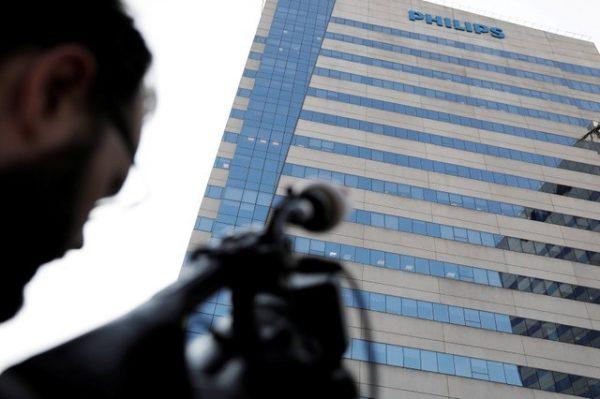 A cameraman records the Philips headquarters in Barueri, on the outskirts of Sao Paulo, Brazil on July 4, 2018. (REUTERS/Nacho Doce)