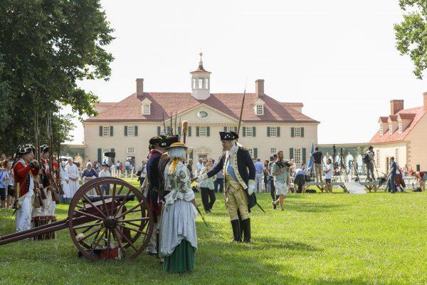 A re-enactment of a military inspection by President George Washington takes place during Independence Day events at Washington's historic home in Mount Vernon, Va., on July 4, 2018. (Samira Bouaou/The Epoch Times)