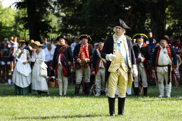 A re-enactment of a military inspection by President George Washington takes place during Independence Day events at Washington's historic home in Mount Vernon, Va., on July 4, 2018. (Samira Bouaou/The Epoch Times)