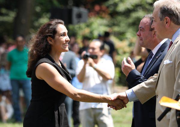 Marcela Rosa from Chile obtains her naturalization certificate during an event at President George Washington's historic home in Mount Vernon, Va., on July 4, 2018. (Samira Bouaou/The Epoch Times)