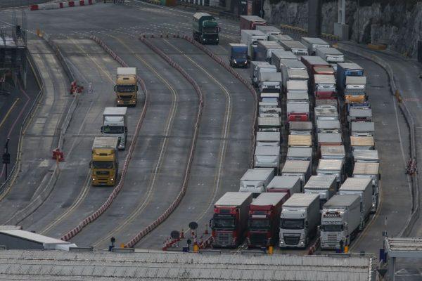 Trucks queue at the entrance of the port of Dover on the south coast of England on March 19, 2018. (Daniel Leal-Olivas/AFP/Getty Images)