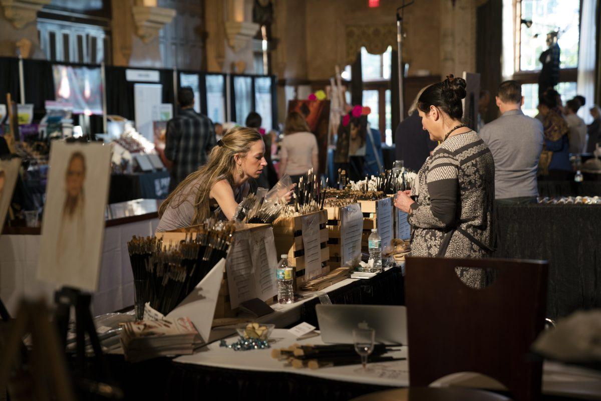 Rosemary Thompson (R) at the Expo stand of Rosemary & Co., during FACE at the Biltmore Hotel in November 2017. (Fine Art Connoisseur)