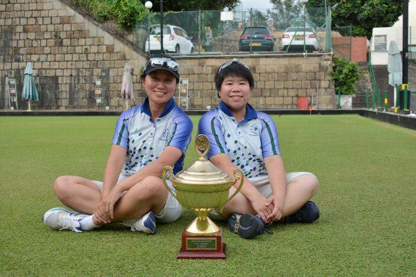 Dorothy Yu (left) and Vivian Yip from the Hong Kong Football Club won their first National Pairs title at the first Finals Day of the year last Sunday, July 1. They defeated Erica Leung and Joanne Leung from Filipino Club 15:12 in a tight final. (Stephanie Worth)