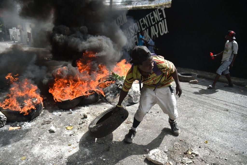 Protesters barricade a street in the Port-au-Prince suburb of Petion-Ville on July 7, 2018, to protest against the increase in fuel prices. (HECTOR RETAMAL/AFP/Getty Images)