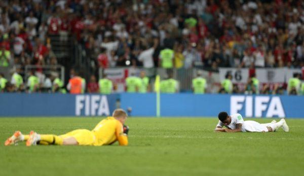England's Jordan Pickford and Marcus Rashford look dejected after the match (REUTERS/Carl Recine)