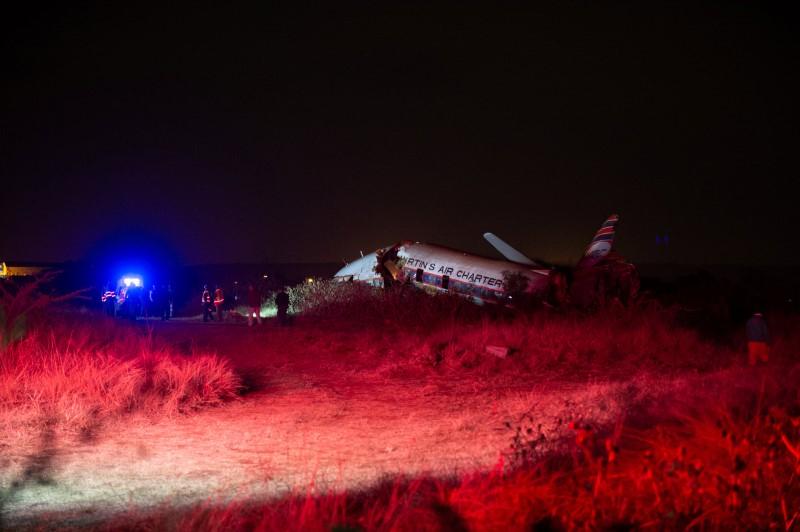 Emergency Services attend the scene of a plane crash outside South Africa's capital Pretoria, South Africa, July 10,2018. (Yeshiel Panchia/Reuters)