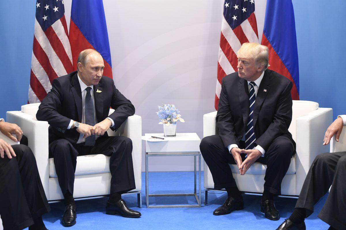 President Donald Trump and Russian President Vladimir Putin on the sidelines of the G-20 Summit in Hamburg, Germany, on July 7, 2017. (Saul Loeb/AFP/Getty Images)