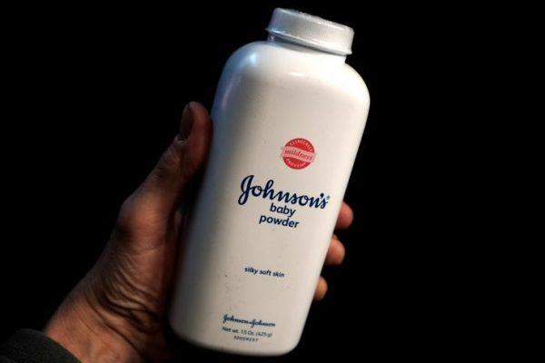 A bottle of Johnson and Johnson Baby Powder is seen in a photo illustration taken in New York on Feb. 24, 2016. (Reuters/Mike Segar)