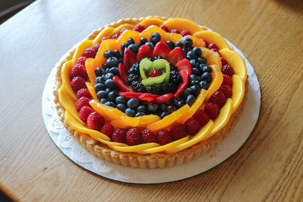 The stunning fresh fruit tart at Pastiche is almost too pretty to eat. (Channaly Philipp/The Epoch Times)