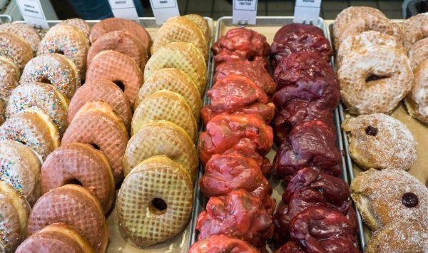 The colorful selection at Knead Doughnuts. (Crystal Shi/The Epoch Times)