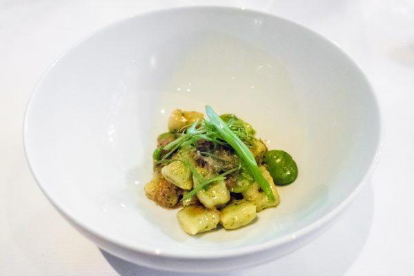 Local flint corn and polenta gnocchi with braised local lamb, fava beans, morels, and green onions at Gracie's. (Crystal Shi/The Epoch Times)