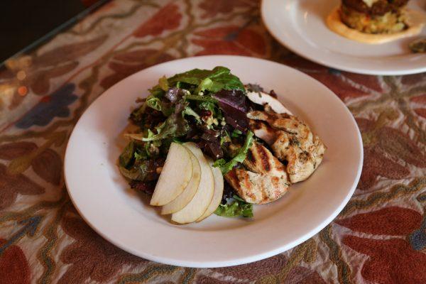 The Sophia, with dried cranberries, walnuts, gorgonzola, and a caramelized onion champagne vinaigrette. (Channaly Philipp/The Epoch Times)