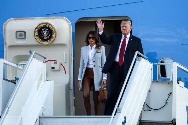 President Donald Trump and First Lady Melania Trump deplane in Helsinki, Finland, on the eve of Trump's meeting with Russian President Vladimir Putin, on July 15, 2018. (Samira Bouaou/The Epoch Times)