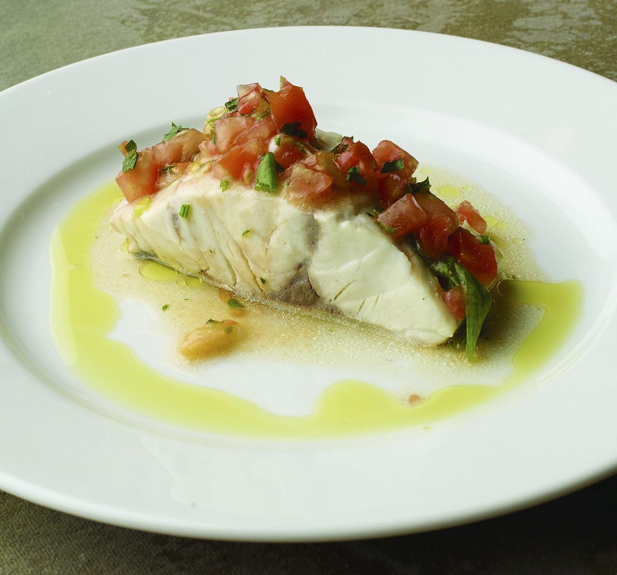 Poached Wild Striped Bass With Tomato and Garlic
