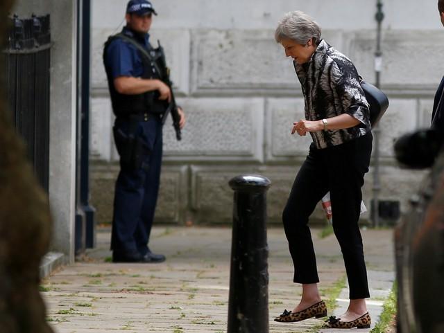 Britain’s May Wins Parliament Vote After Bowing to Brexit Pressure