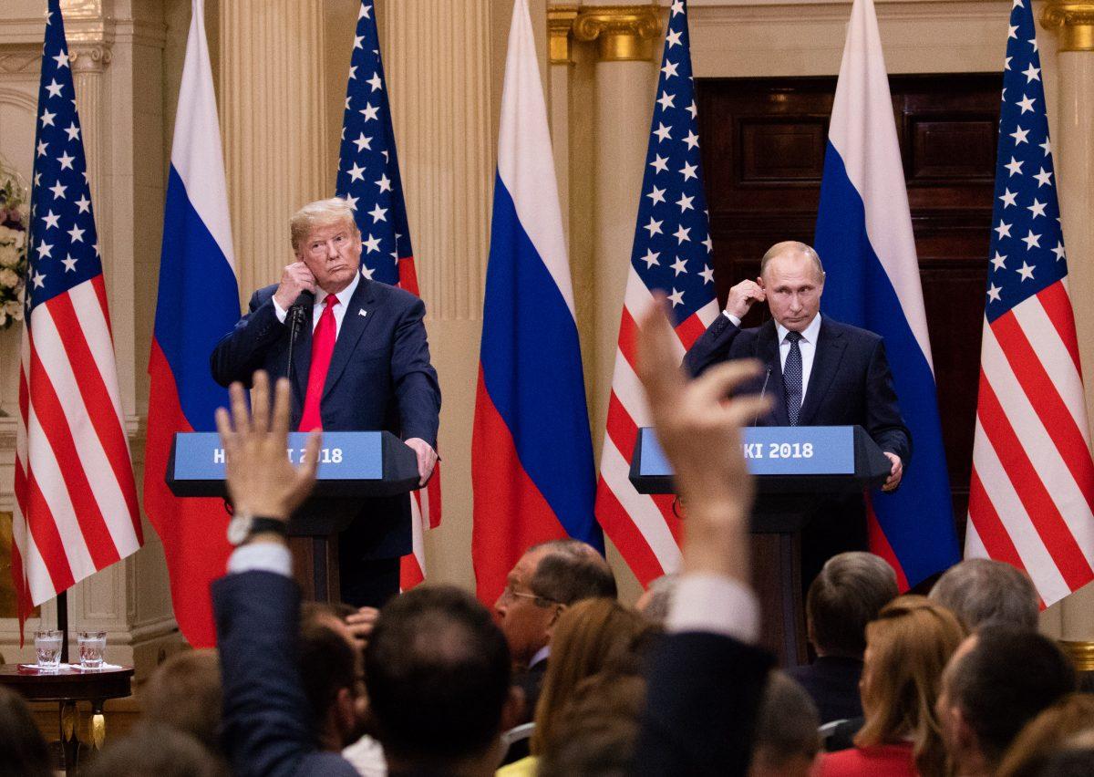 President Donald Trump and the Russian President Vladimir Putin hold a joint press conference at the Presidential Palace in Helsinki, on June 16, 2018. (Samira Bouaou/The Epoch Times)